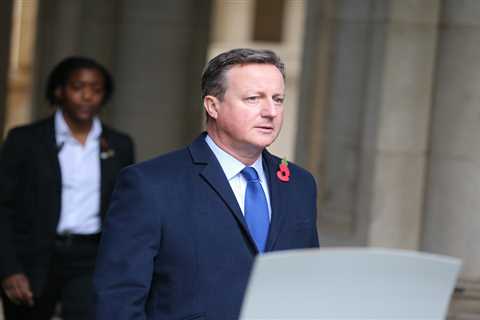 David Cameron under pressure after old business card shows business colleague as ‘senior adviser’..