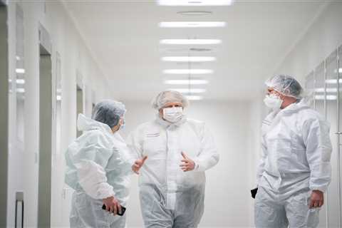 Boris Johnson takes forensic look at AstraZeneca vaccine in jab lab visit