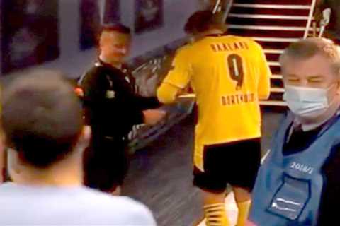 Erling Haaland signs a YELLOW CARD for linesman as official asks for superstar’s autograph in tunnel