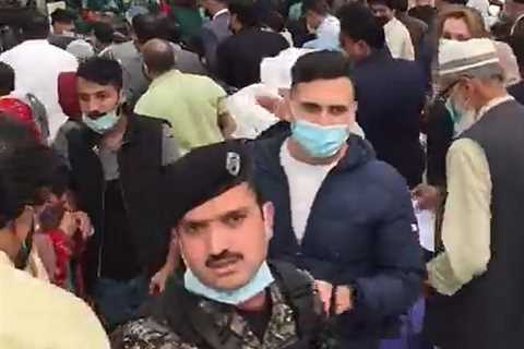 Chaotic scenes unfold at Islamabad Airport as hundreds desperately rush to reach UK before 4am..