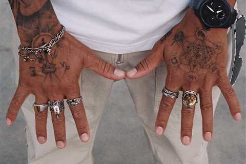Lewis Hamilton posts cryptic message about his hands and hints at what tattoos mean after showing..