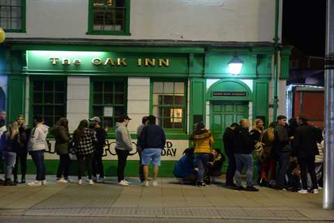 Joy as pubs in England reopen with punters queuing up to get their first pints in months
