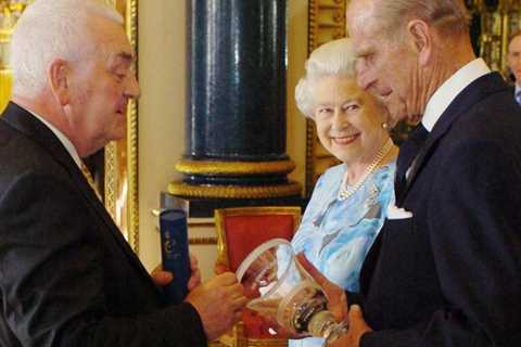 Queen releases heartwarming new pics of her looking affectionately at Prince Philip to honour his..