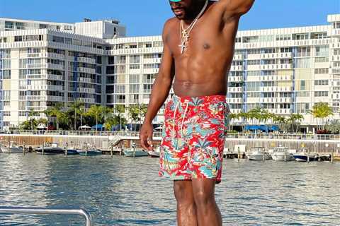 Floyd Mayweather looks in fighting shape aged 44 as he poses topless on yacht ahead of Logan Paul..
