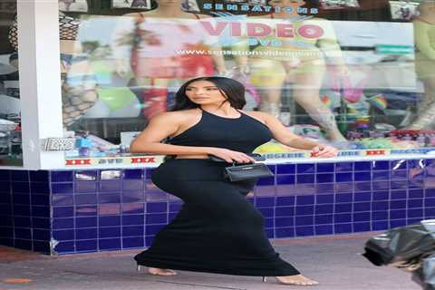 Kim Kardashian visits Miami sex shop and leaves with bags of goodies before hopping on plane back..