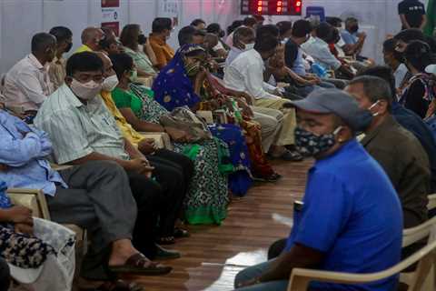 Families pack out UK-bound flights from India at 1,500 people-a-day in mad dash before Friday’s..