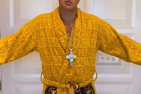 Watch as Tyson Fury leaves Las Vegas hotel in just £400 Versace dressing gown to train for Anthony..