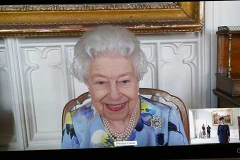 Queen smiles as she holds first engagement since husband Prince Philip’s funeral as she chats to..