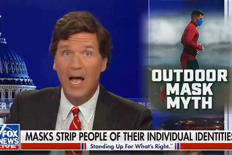 Tucker Carlson compares vaccinated people wearing Covid masks to ‘a grown man exposing himself in..