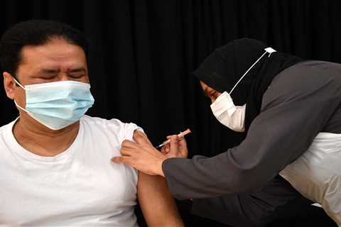 Millions more eligible for Covid jabs from TODAY as age limit lowered twice in a week