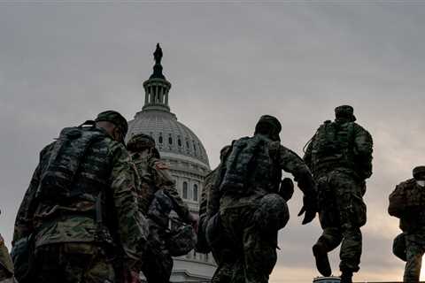 With Cameras Rolling, an Uneasy and Isolated Capitol Receives Biden
