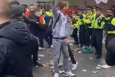 Snarling Man Utd fans pelt cops with bottles and shout ‘f***ing pigs’ in terrifying new video from..
