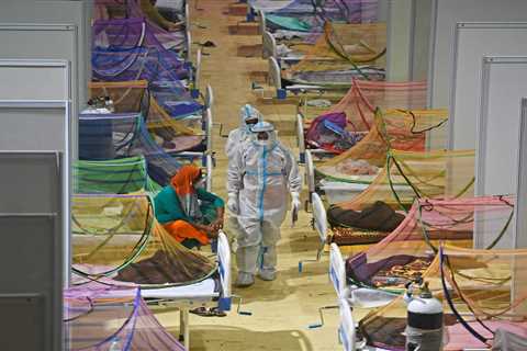 India urged to impose 15-day lockdown after record 400,000 Covid cases in a day