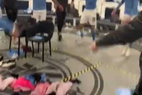 Inside Man City’s wild dressing room celebrations as Mendy puts chair on his head after reaching..