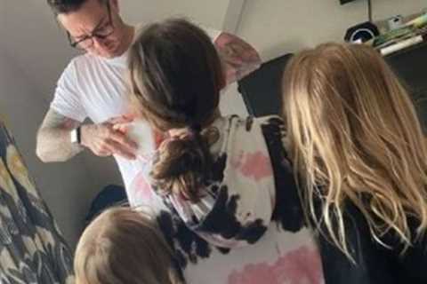 Emma Willis posts rare photo of all three of her children giving dad Matt his birthday presents