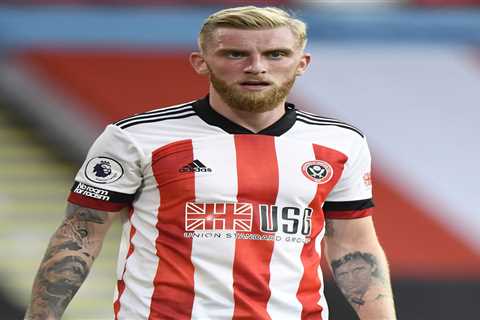 Sheffield United star Oli McBurnie ‘appears to punch man then stamp on phone’ in street bust-up as..