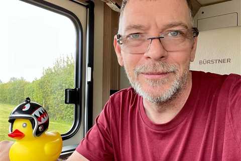 EastEnders star Adam Woodyatt looks totally different to Ian Beale as he poses in campervan home