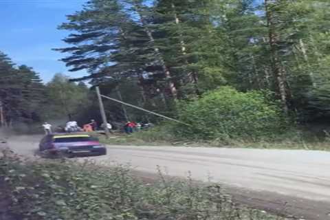Watch terrifying moment rally car misses spectators by INCHES as it barrel rolls towards crowd in..