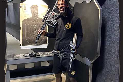 Deontay Wilder armed with THREE guns as he poses in his own underground shooting range ahead of..