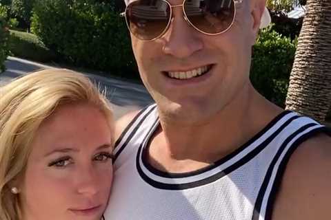 Tyson and Paris Fury pack on PDA with intimate kiss as pair soak up sun together in Miami as he..