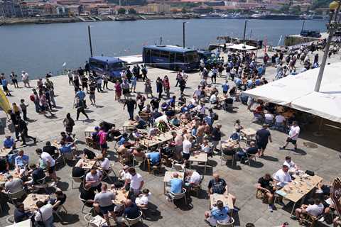 Chelsea &amp; Man City fans pack out bars &amp; down pints in sunny Porto ahead of Champions League ..