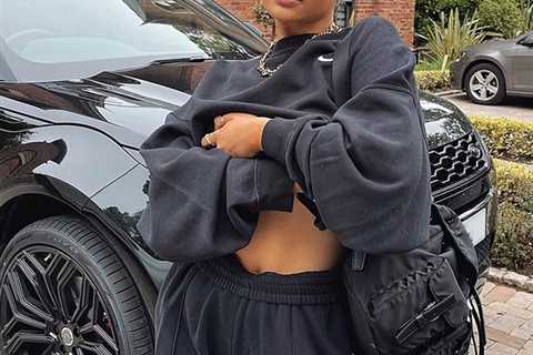 Molly-Mae Hague teases glimpse at toned stomach as she poses in front of brand new £32k Range Rover