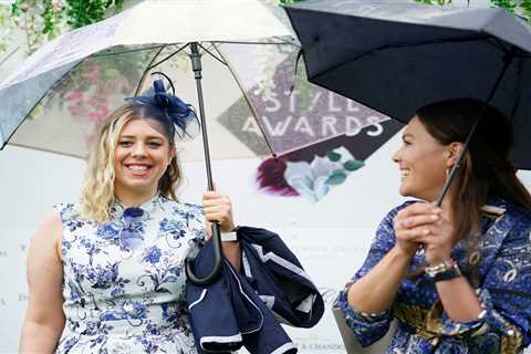 Ladies Day at Epsom hit by driving rain forcing glamorous racegoers to take cover