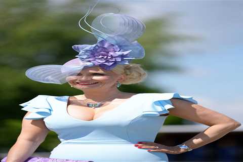 Beaming racegoers arrive dressed to the nines for Epsom Derby Day – even matching facemasks to..