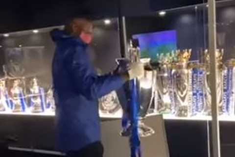Watch Chelsea staff carefully place second Champions League trophy in their cabinet after its..