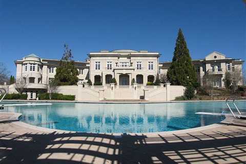 Evander Holyfield’s amazing 109-room Georgia home he sold to Rick Ross for £4.7m boasts bowling..