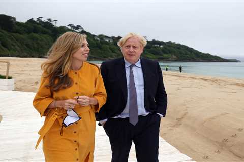 Boris Johnson and Carrie Symonds on first public outing together since they wed as they hit the..