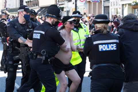 Woman, 55, slammed for ‘disgraceful’ stunt after running topless through Windsor streets on Prince..