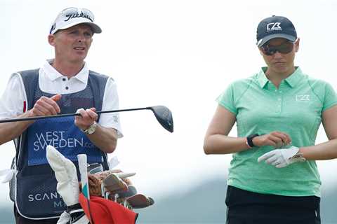 Mike Dean caddies for Whitney Hillier at Scandinavian Mixed event in Sweden after Prem ref swaps..