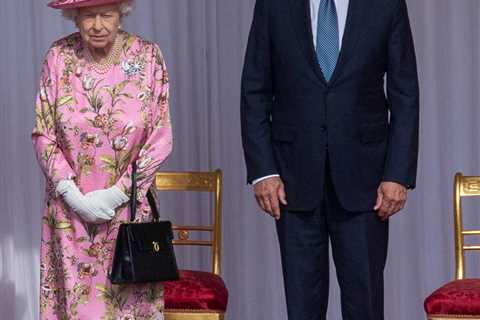 Biden appears to break royal protocol for third time by wearing sunglasses to meet the Queen, say..