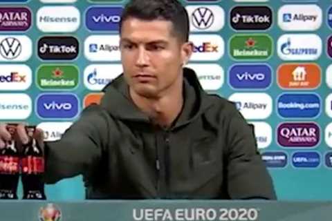 Russia’s Stanislav Cherchesov refuses to ‘do a Cristiano Ronaldo’ as he DRINKS bottle of Coca-Cola..