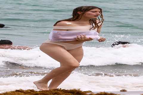 Eugenie Bouchard takes dip in sea with arm in sling on holiday in Miami with NFL star boyfriend..