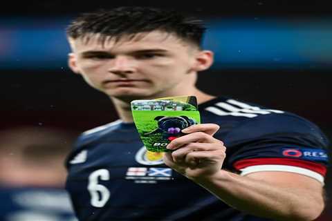 Kieran Tierney shows off custom shin pads featuring a dog picture after heroic Scotland display vs..