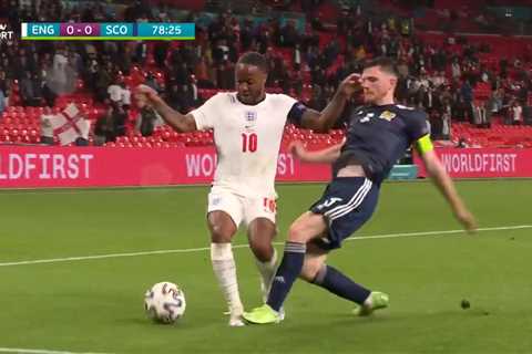 Watch Raheem Sterling go down under Andrew Robertson challenge as England fans split on penalty..