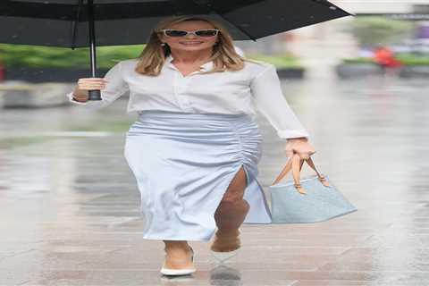 Amanda Holden flashes her tanned legs in thigh-split skirt as she leaves radio job