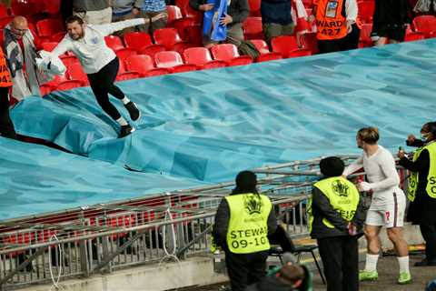 Watch England fan leap onto seat coverings to grab Jack Grealish’s shirt as he tosses it into crowd ..