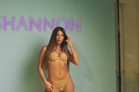 Love Island’s Shannon Singh struts in a thong as topless hunk Jake Cornish hoses himself in first..