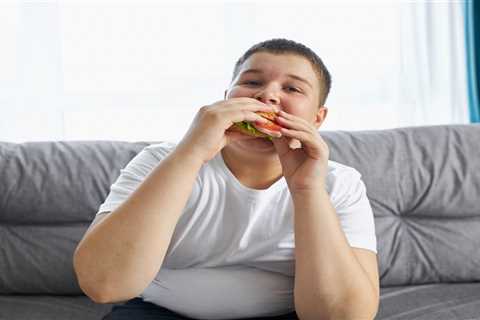 Junk food ads to be banned on TV before 9pm watershed in bid to crackdown on obesity