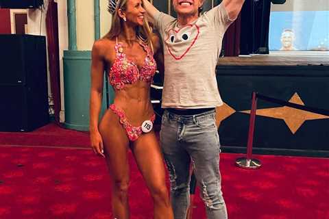Olly Murs celebrates with girlfriend Amelia Tank after she wins Pure Elite Pro overall UK champion