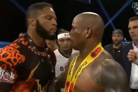 Watch ex-UFC star Hector Lombard PUNCH rival Lorenzo Hunt in the face during interview after..