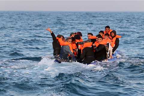 People smugglers packing more migrants on military-style inflatable boats to beat shortage of..