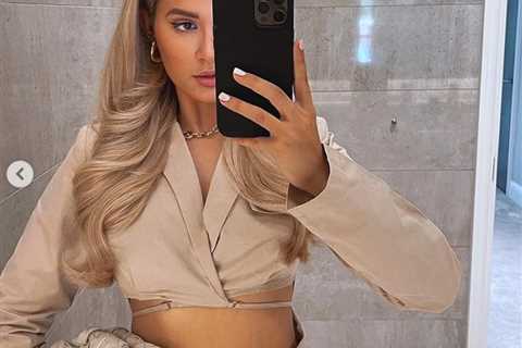 Molly-Mae shows off her tiny waist in a cropped jacket and mini skirt after weight loss