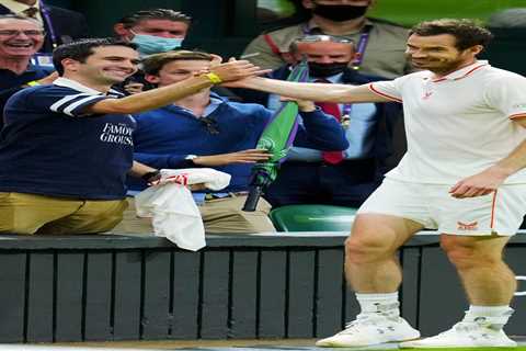 Classy Andy Murray hands match-worn shirt to two fans who cheered him on to stunning comeback..