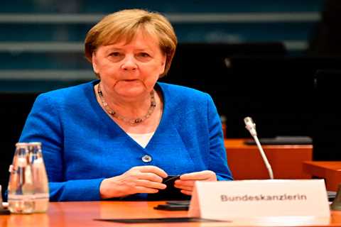 Angela Merkel to climbdown over EU holiday ban threat in boost for foreign hols as she jets in for..