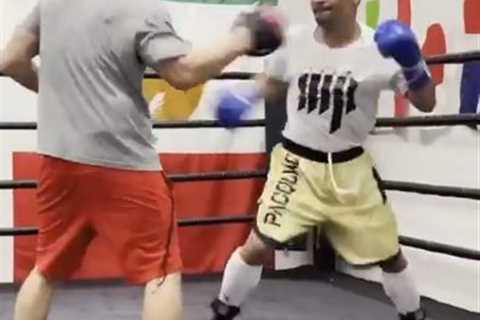 Watch Manny Pacquiao look electric in training as he reunites with trainer Freddie Roach ahead of..