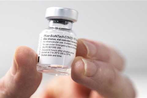 Britain ‘running short’ on Pfizer vaccine with science chiefs urged to scrap Oxford under-40s ban